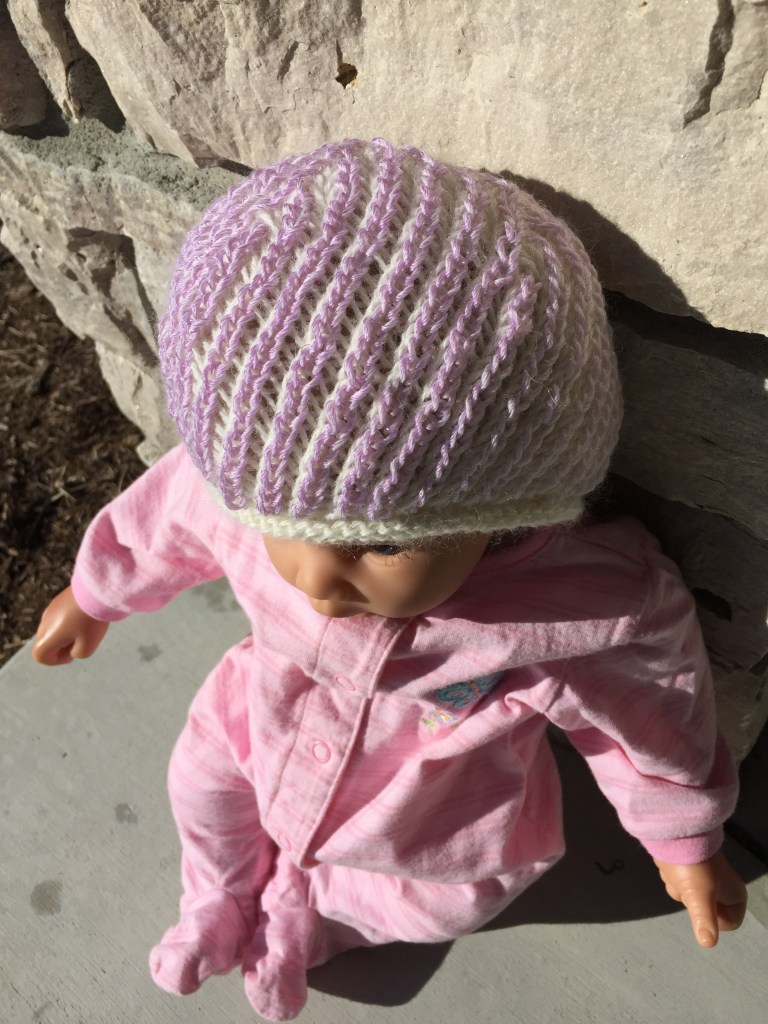 Abracadabra yarn changes color in the sunlight.